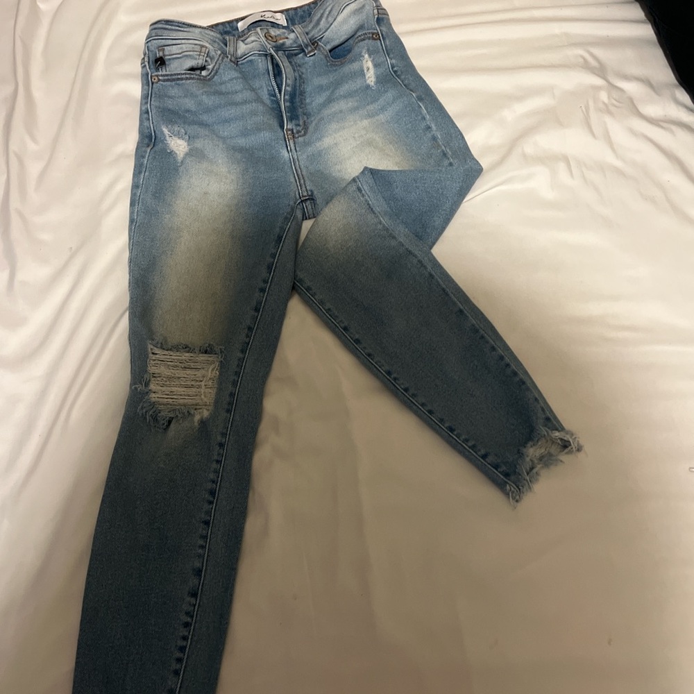 Blue ripped jeans